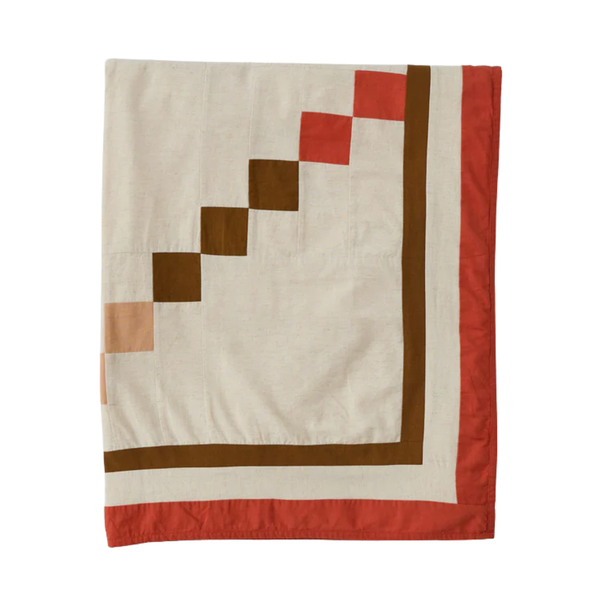 a cream cotton bedspread with red and brown patchwork details