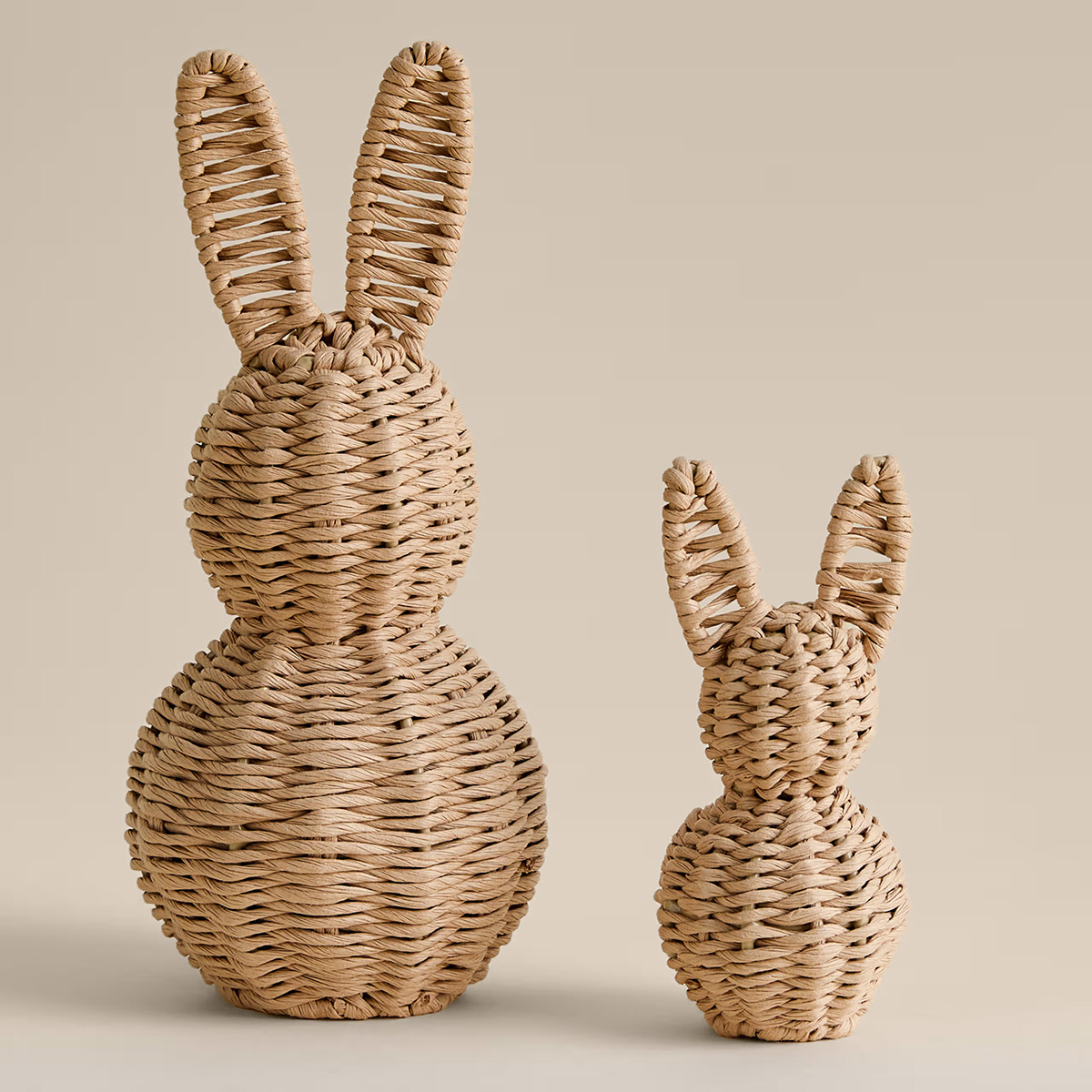 two rattan bunnies