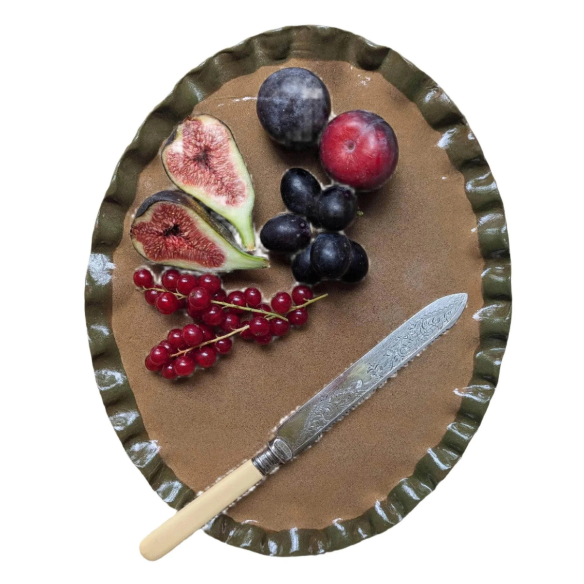 a brown oval platter with an olive green frill edge