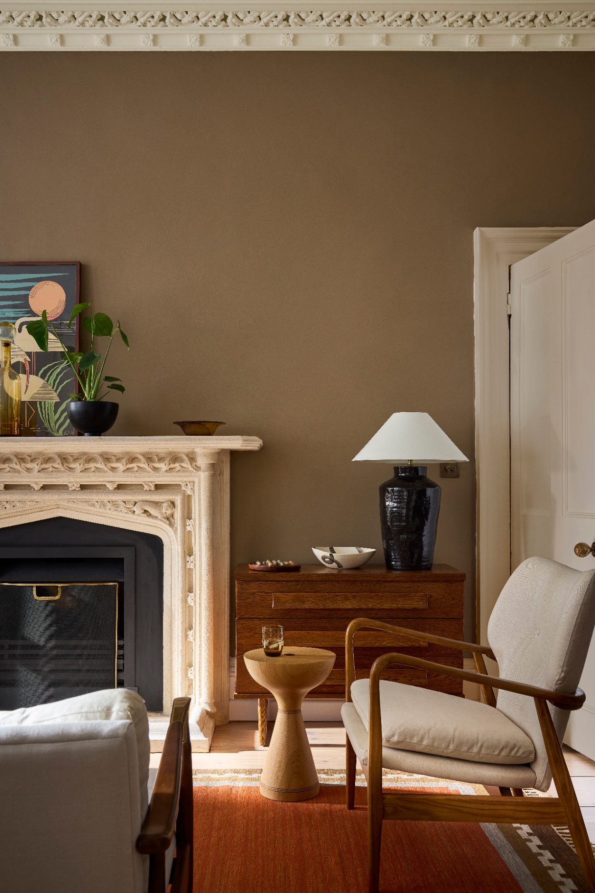 a beautiful living room pictured with little greenes colour of the year featured on the walls in marle brown 