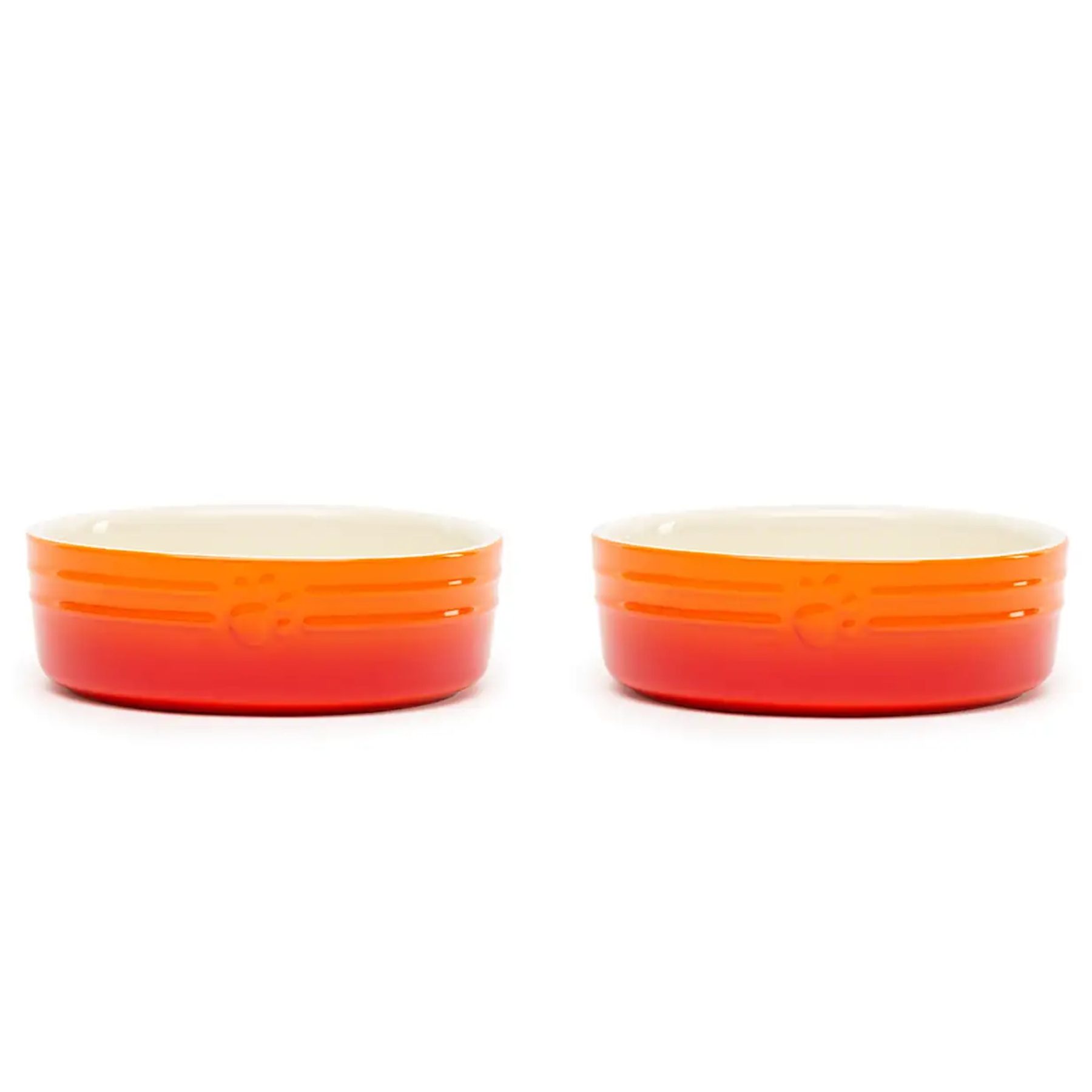 two ombre orange dog bowls