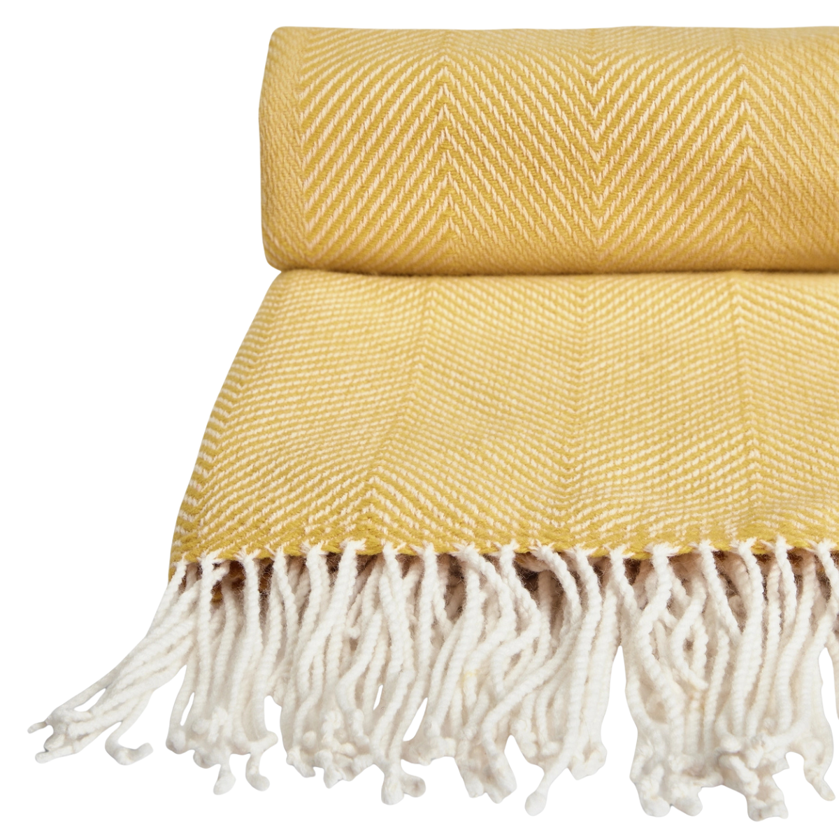 a yellow herringbone throw with white tassels