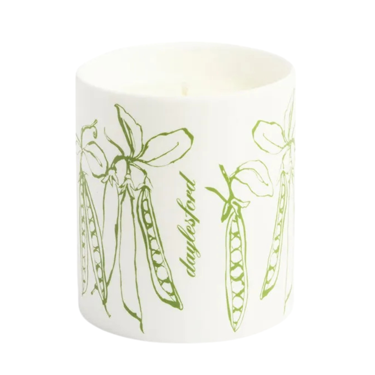 a white ceramic candle with green pea illustrations