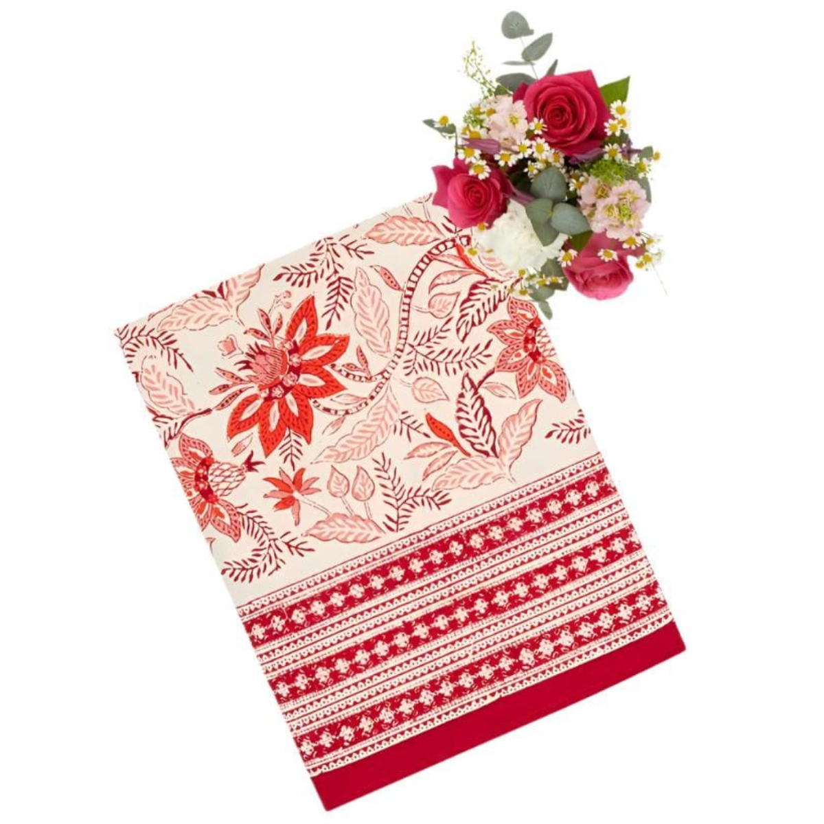 a red and white floral patterned tablecloth with a bunch of roses