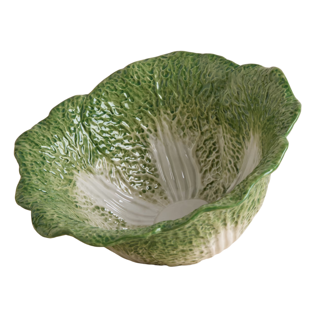 a green bowl in the shape of a cabbage