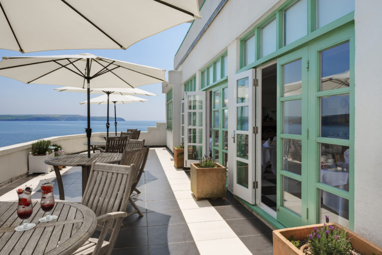 the-sunny-terrace-of-the-ganges-room-at-burgh-island