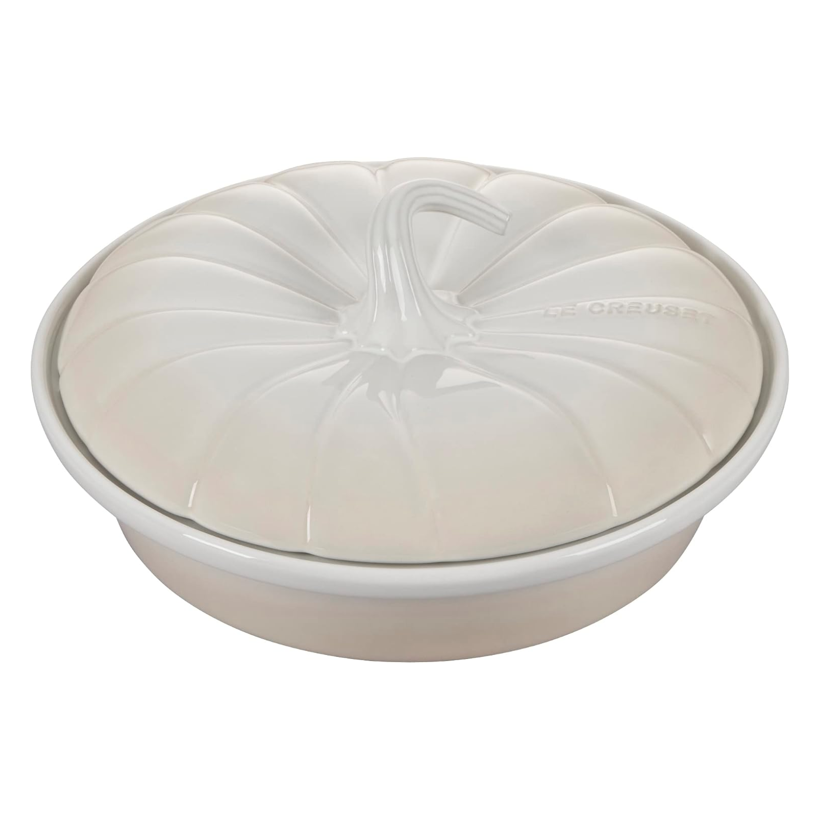 Cream ceramic round Le Creuset pie dish with a sculpted pumpkin-shaped lid and stem handle