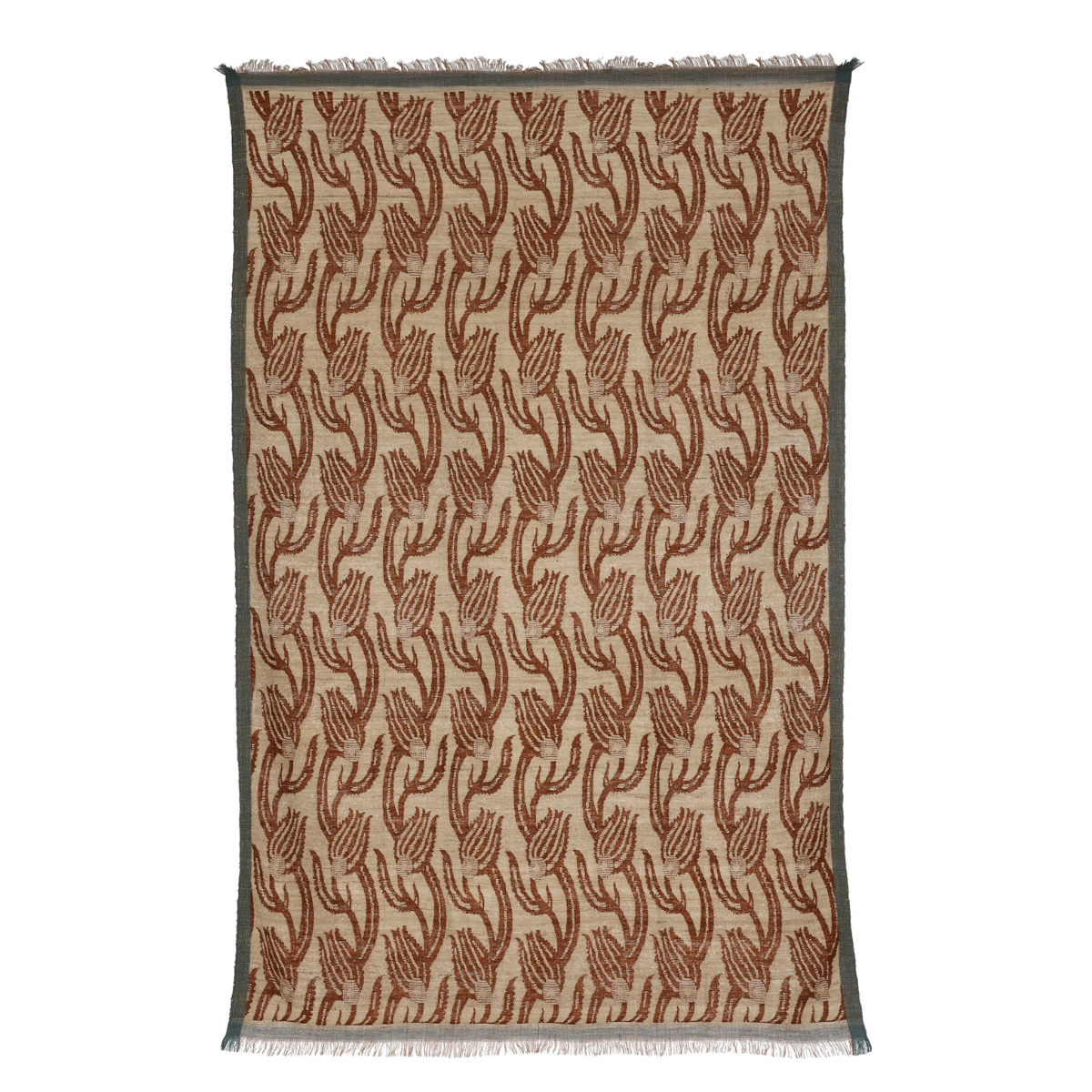 A cream throw with rust botanical print