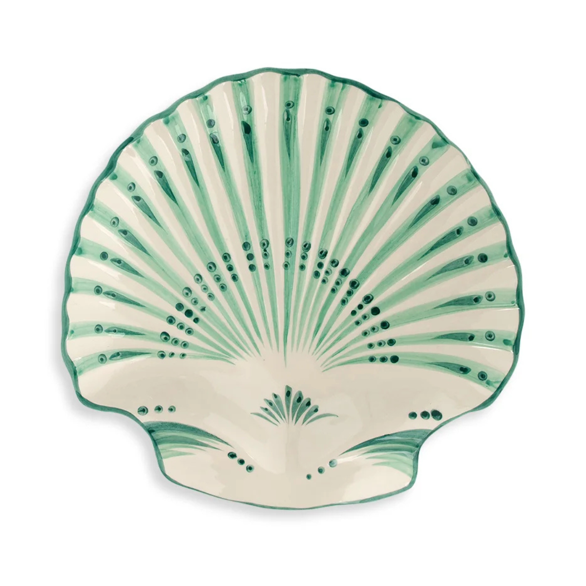 a green and white shell shaped plate
