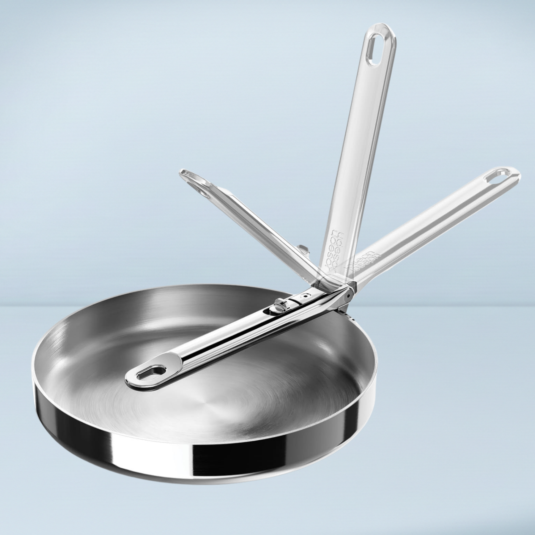 a silver frying pan a folding handle