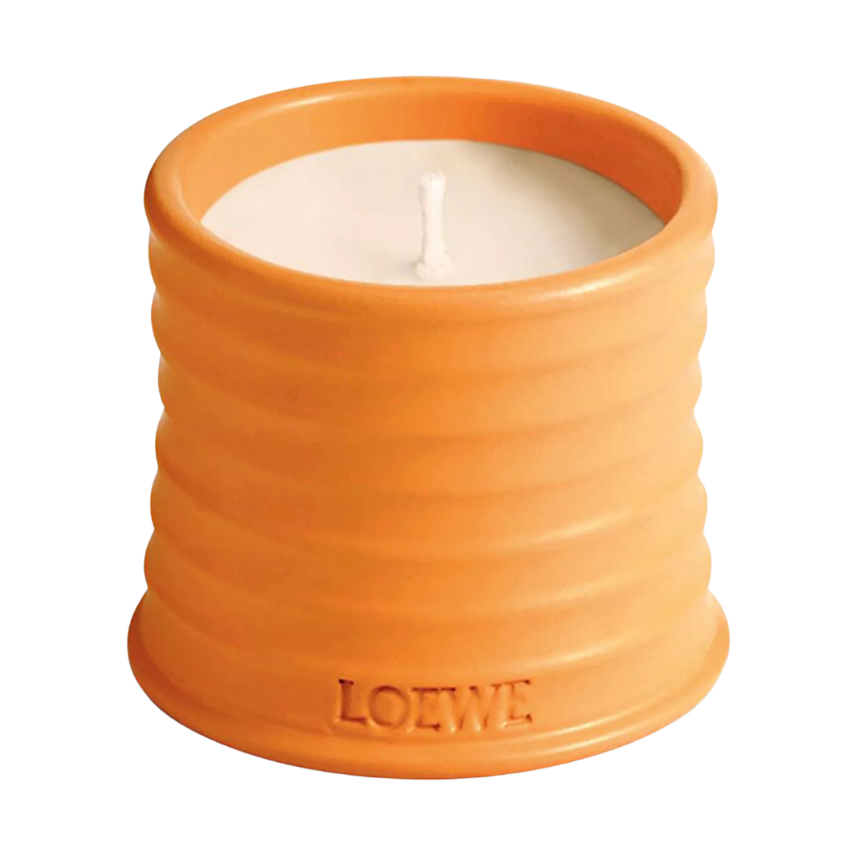 AN ORANGE RIBBED CANDLE