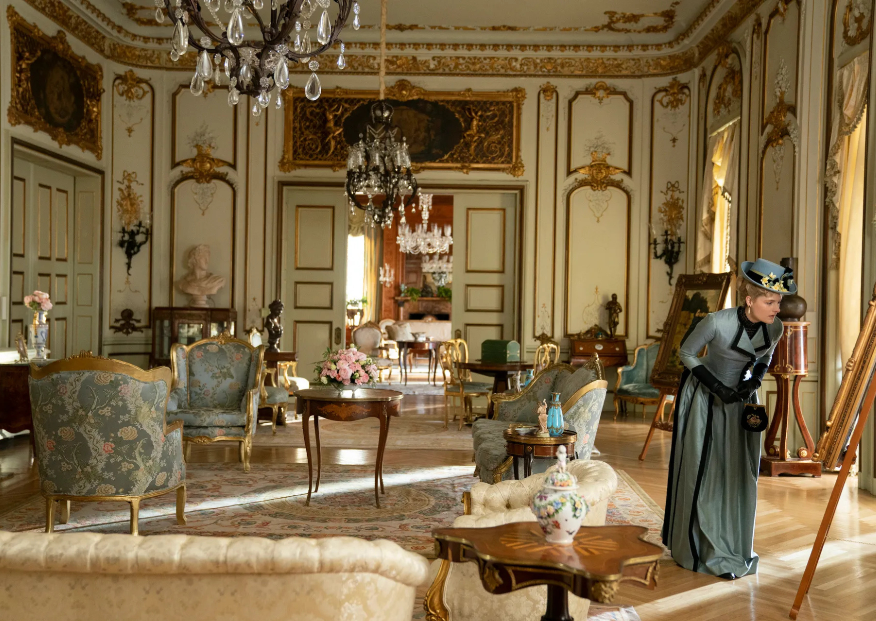 a scene in the drawing room from the gilded age
