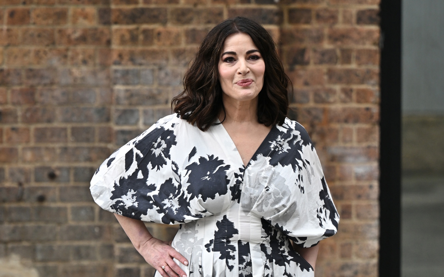 Nigella Lawson wearing a black and white floral dress