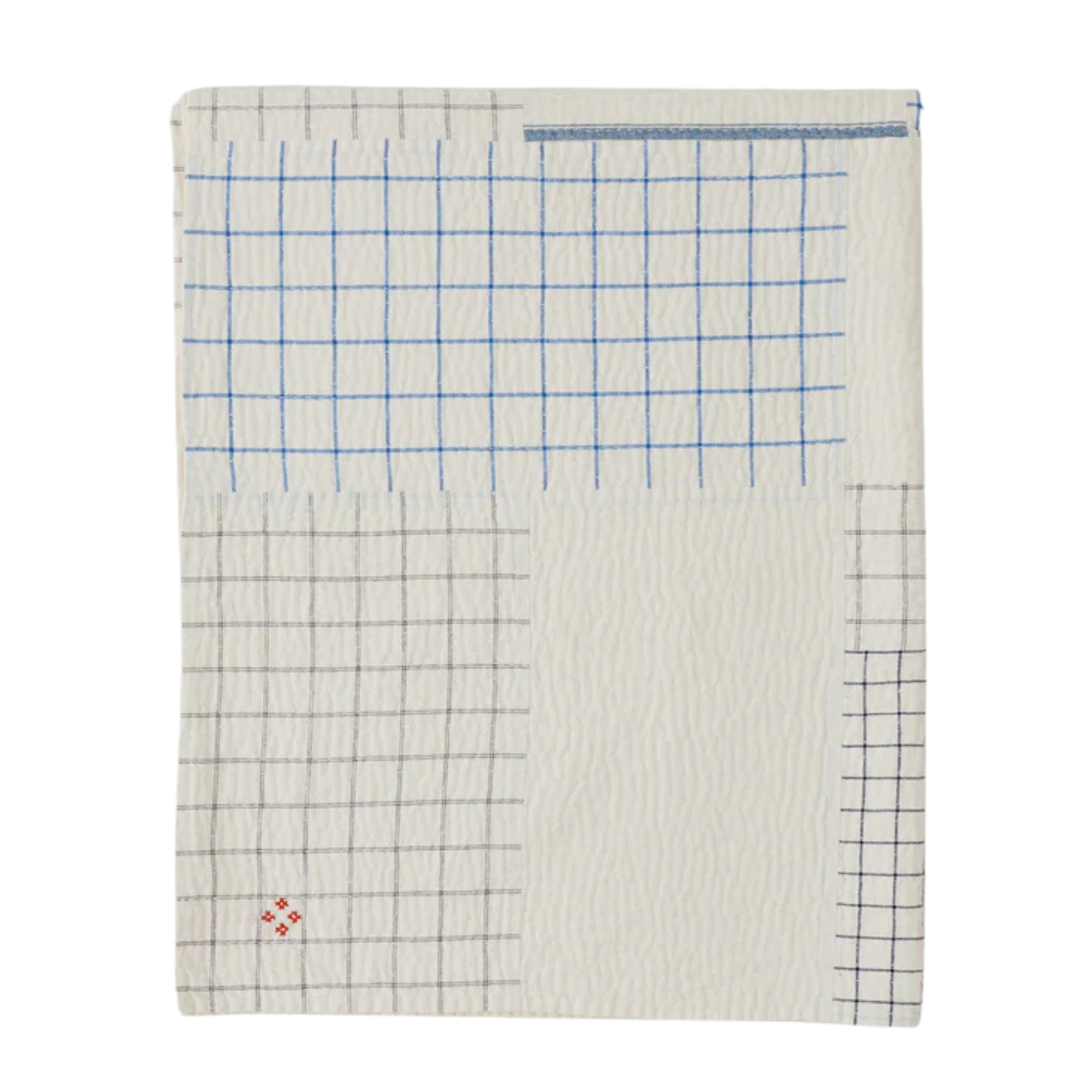 A CREAM BEDSPREAD WITH A BLUE TEA TOWEL INSPIRED CHECK