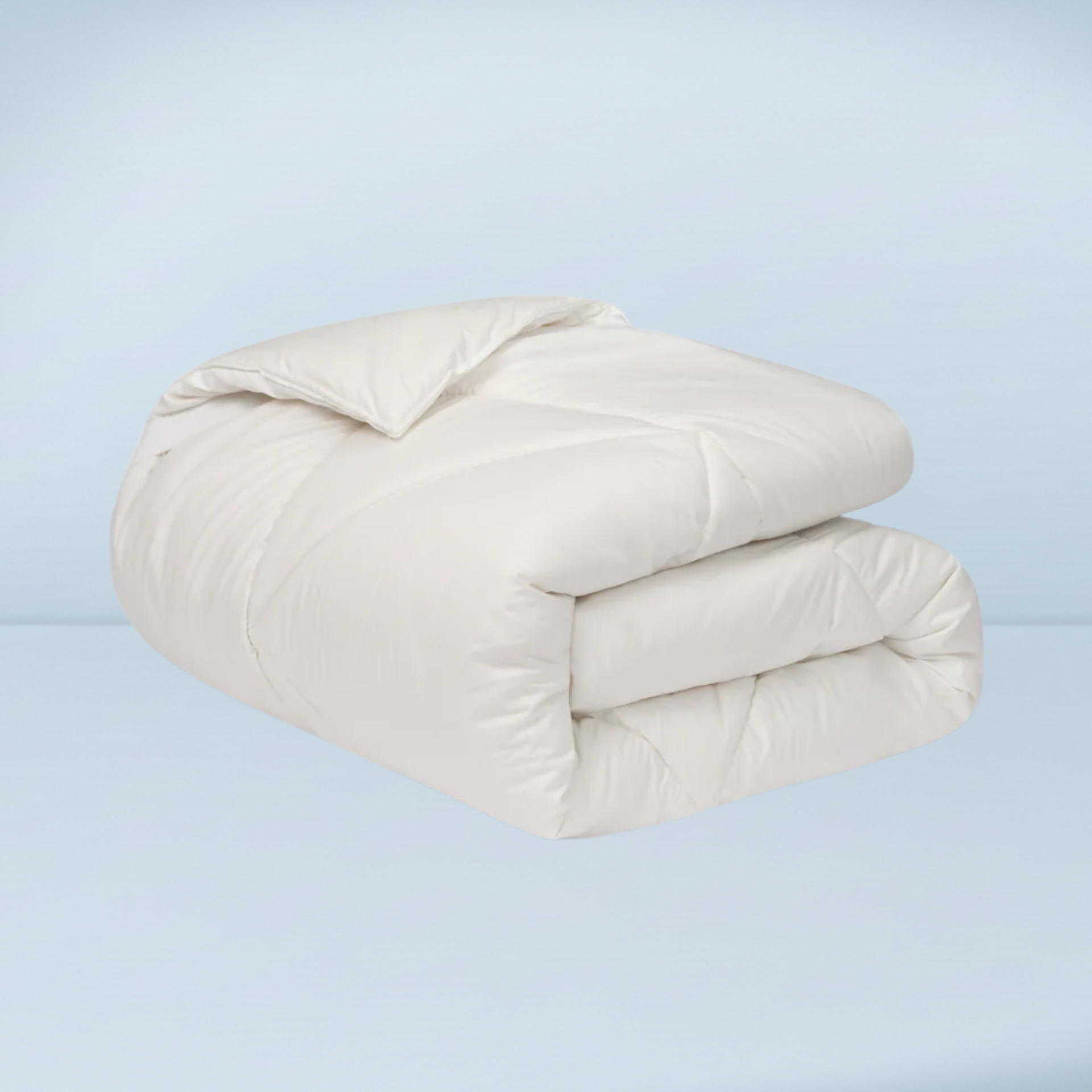 a folded up mattress topper