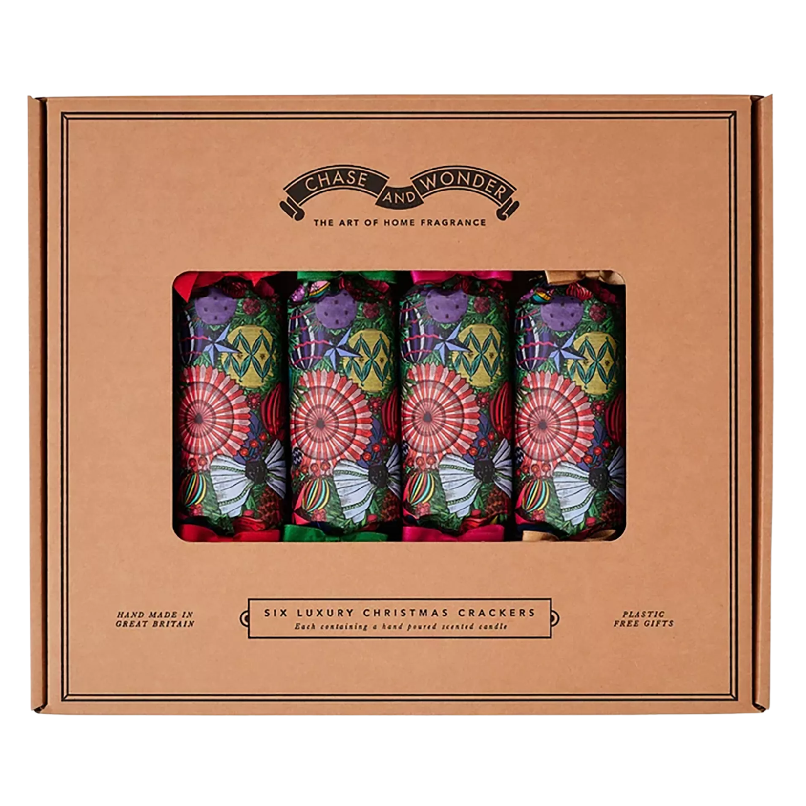 A brown kraft presentation box containing six Chase and Wonder luxury Christmas crackers. Visible through the window, the paper features a vibrant, colorful bauble print in red, green, purple, and gold, tied with colorful satin ribbon bows