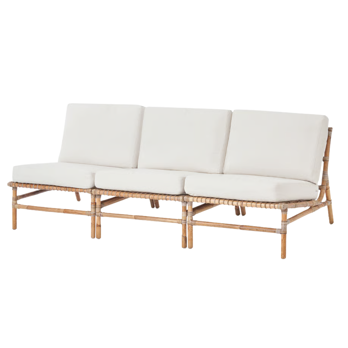 A cane modular outdoor sofa with off white cushions