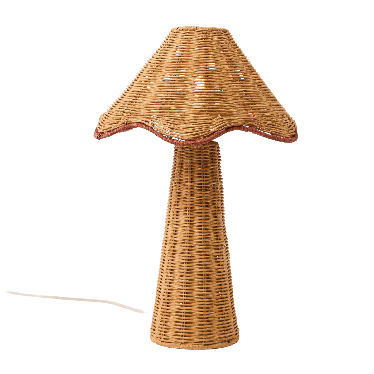 a rattan table lamp with a rattan scalloped shade
