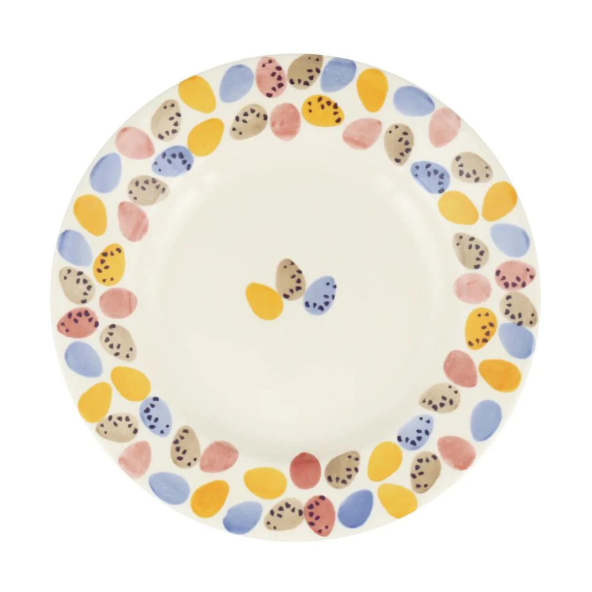 a white dinner plate with colourful mini eggs printed on