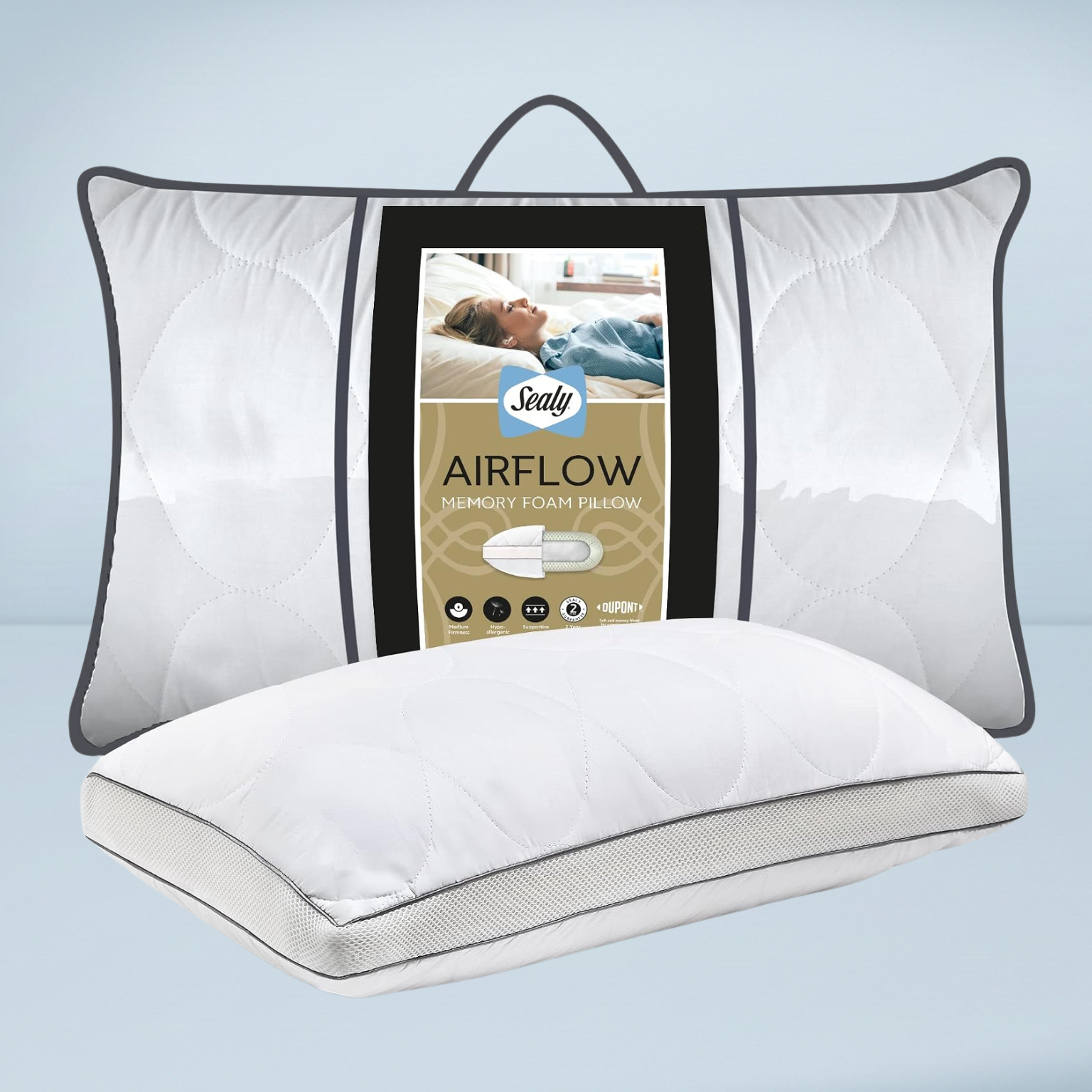 a white sealy memory foam pillow with a clear plastic carry case