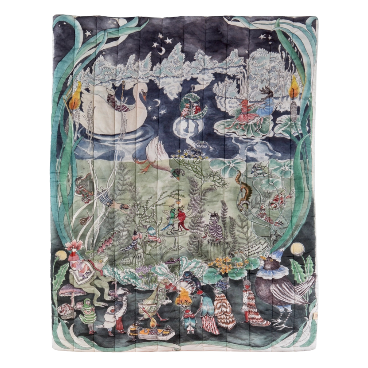 a navy and sage green illustrated quilted blanket