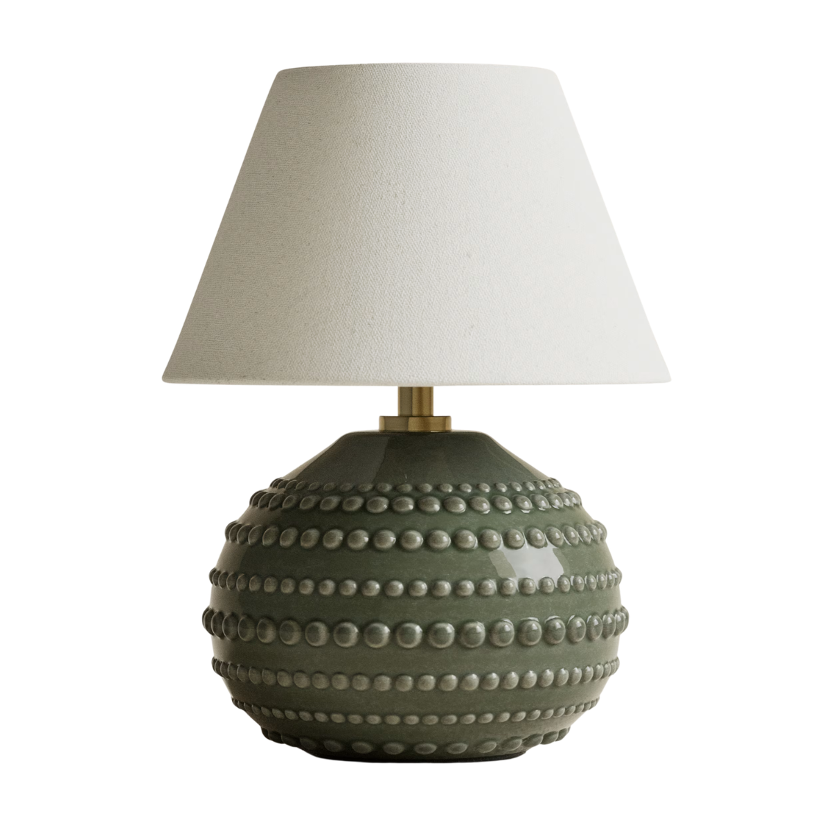A ROUND OLIVE GREEN BOBBLE PATTERNED LAMP WITH A PLAIN CREAM SHADE