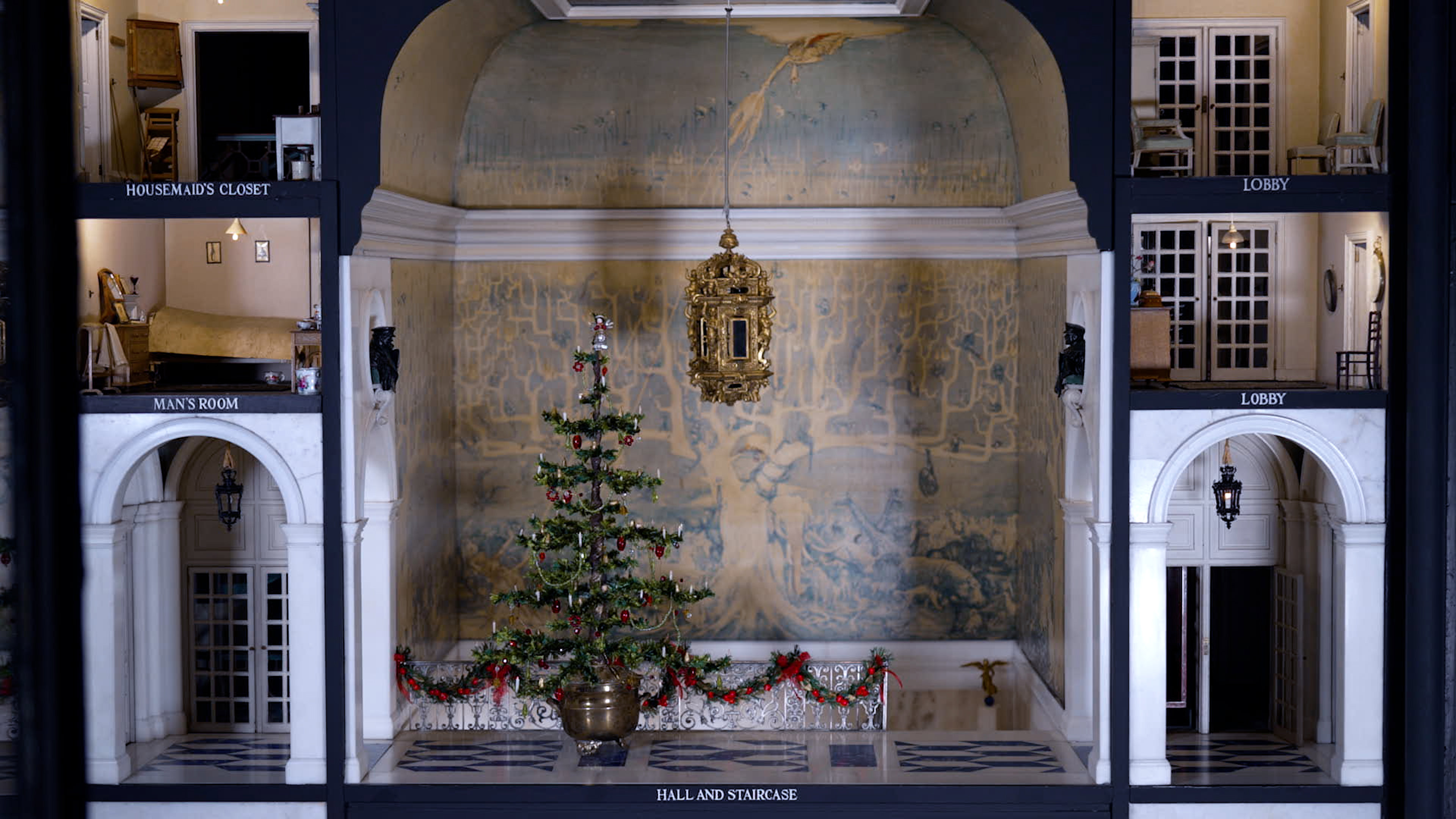 Miniature Christmas decorations inside Queen Mary's Dolls House at Windsor Castle