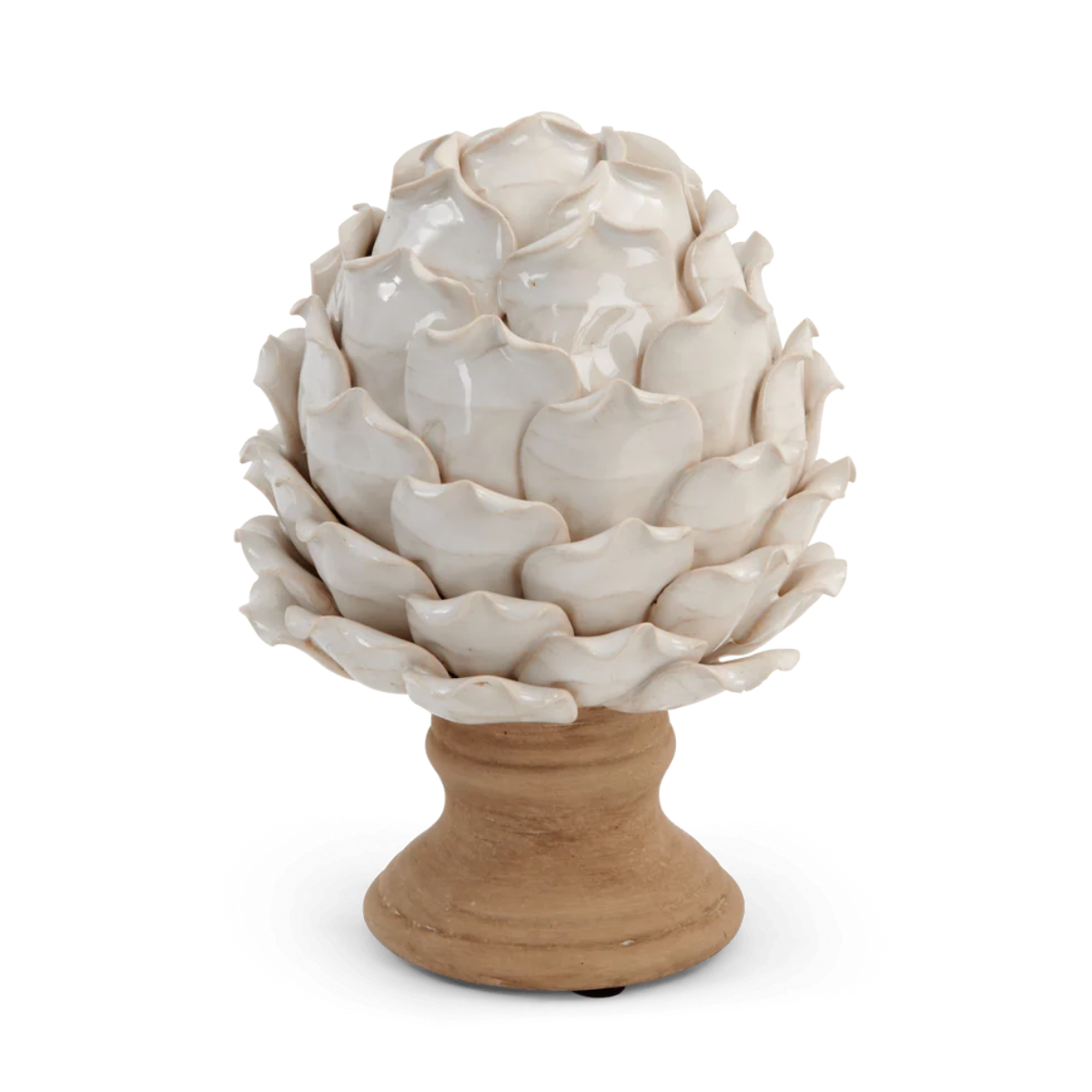 a cream artichoke ornament on a wooden base