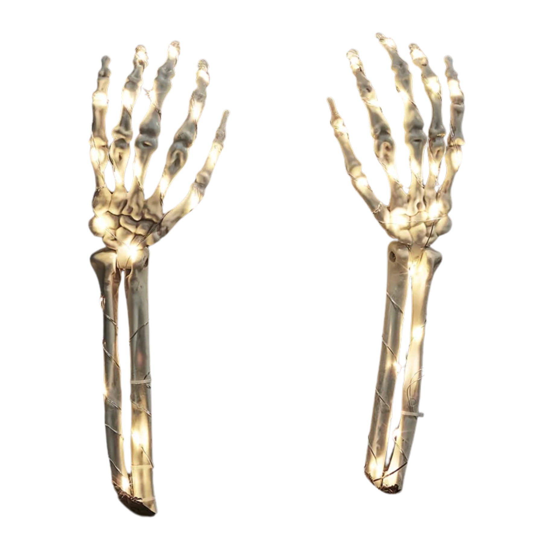a pair of white skeleton stake lights with led lights wrapped around them