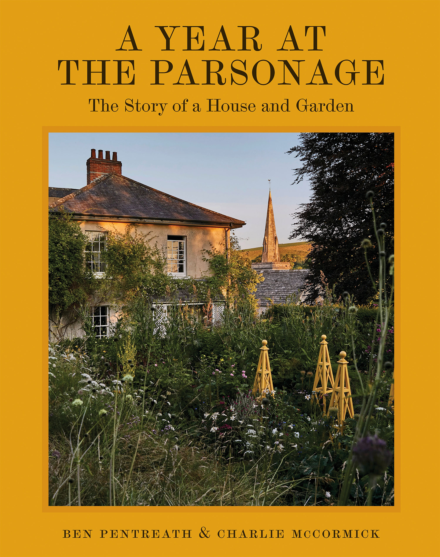 A book cover with the title a year at the parsonage, and a picture of a 19th-century house with a cottage-style garden in front