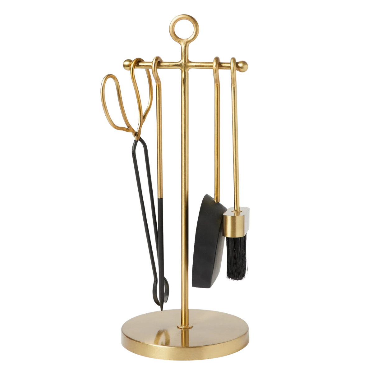 a gold set of fireplace accessories