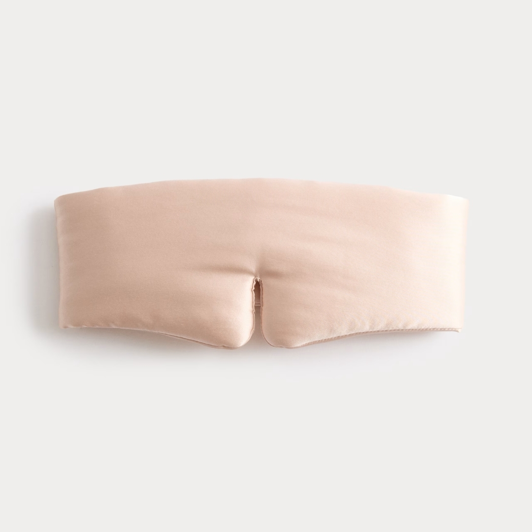 Marks and spencers Ultimate Comfort Pure Mulberry Silk Eye Mask pictured in dusky pink on a white background