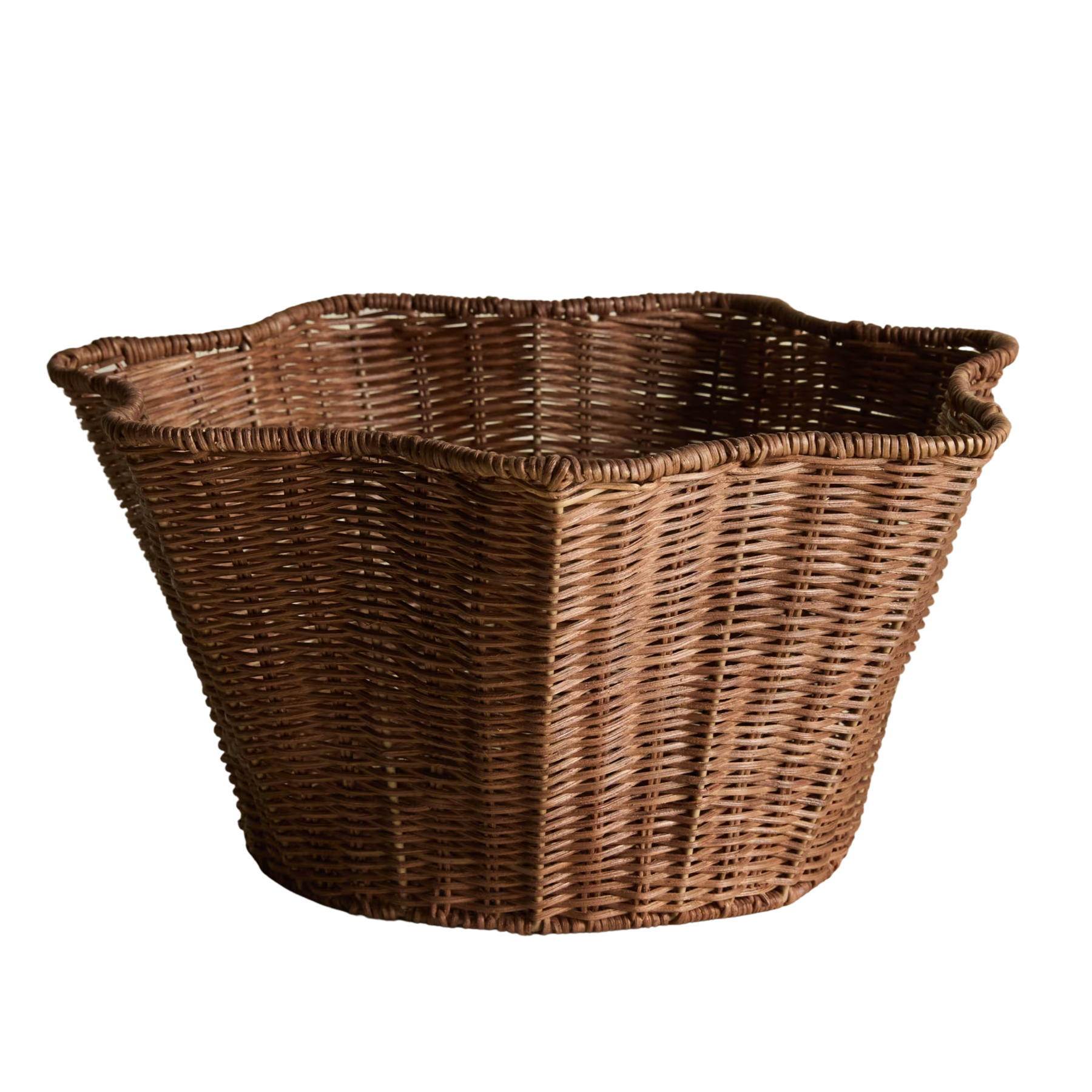a dark brown scalloped rattan bowl