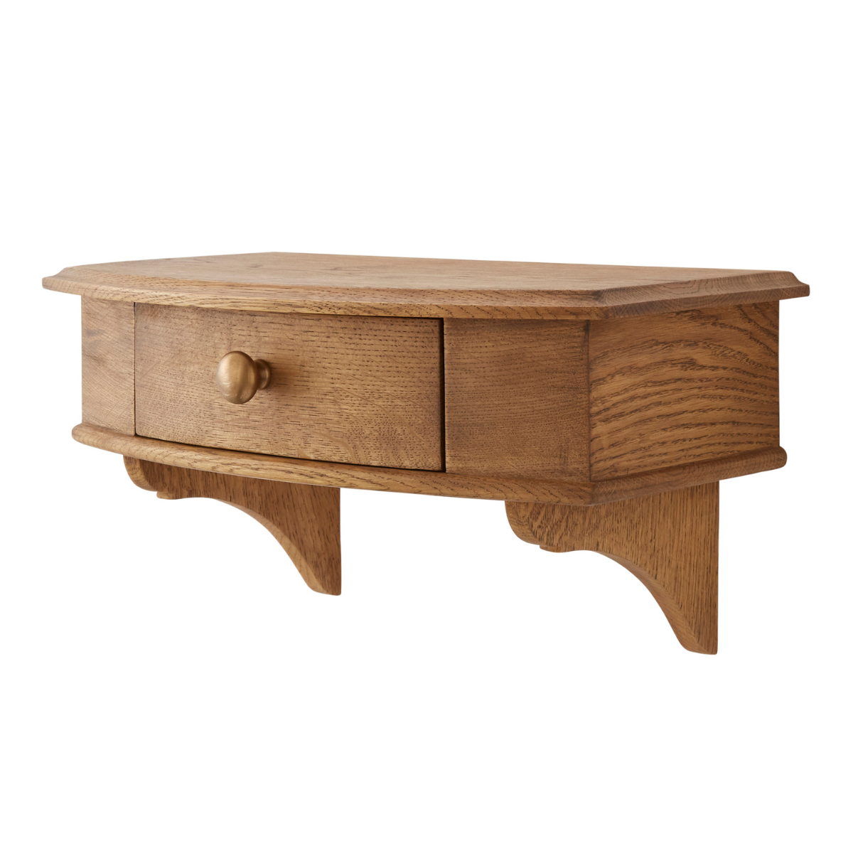 a wooden floating small bedside shelf with a drawer